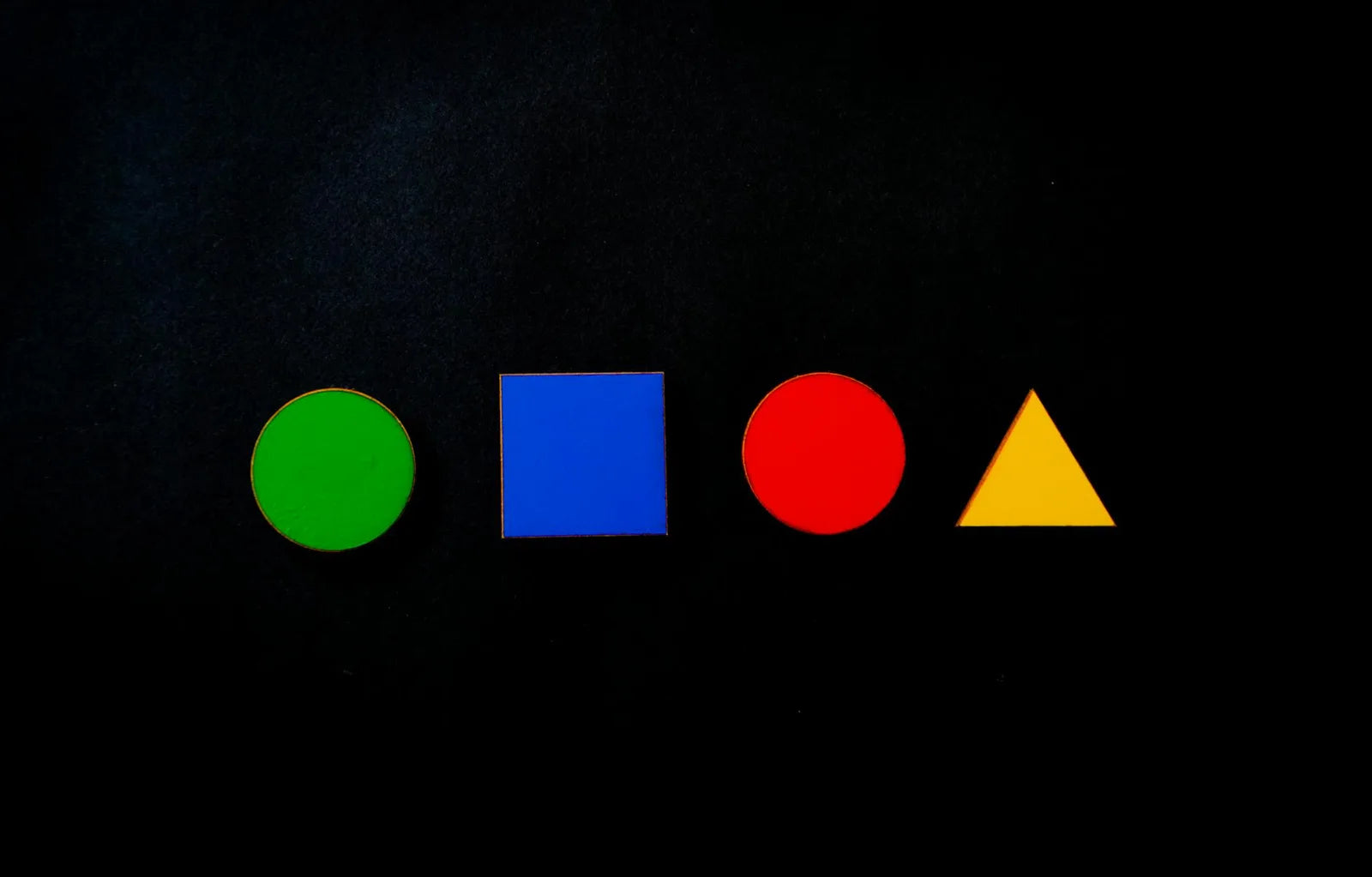Primary geometric forms, red circle blue square yellow triangle