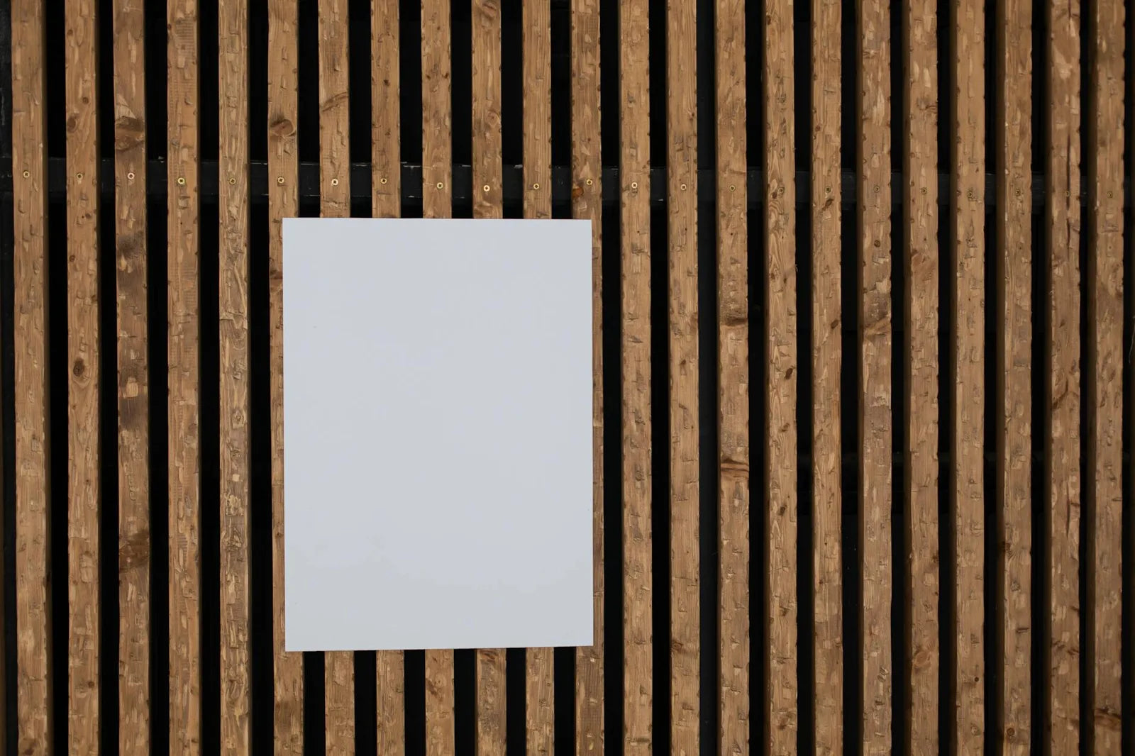 Oak-framed poster, light wall