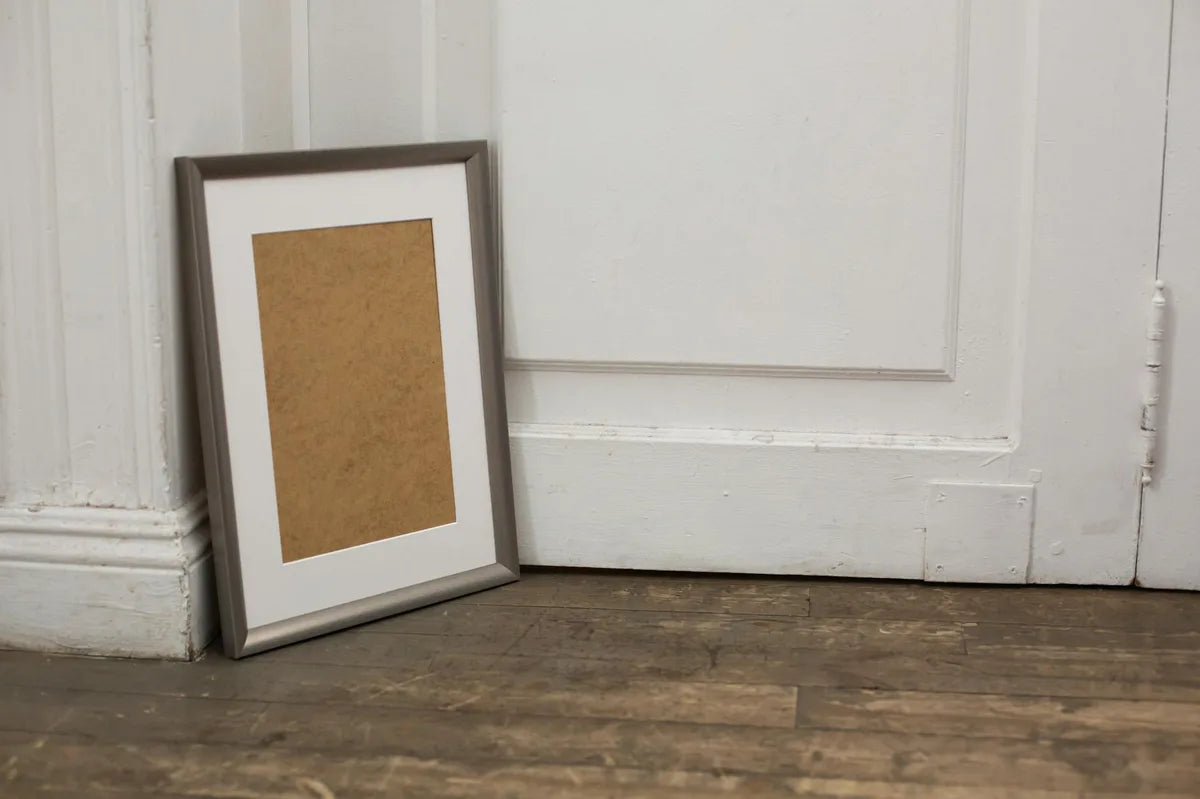 Frames stacked on the floor, composition stage
