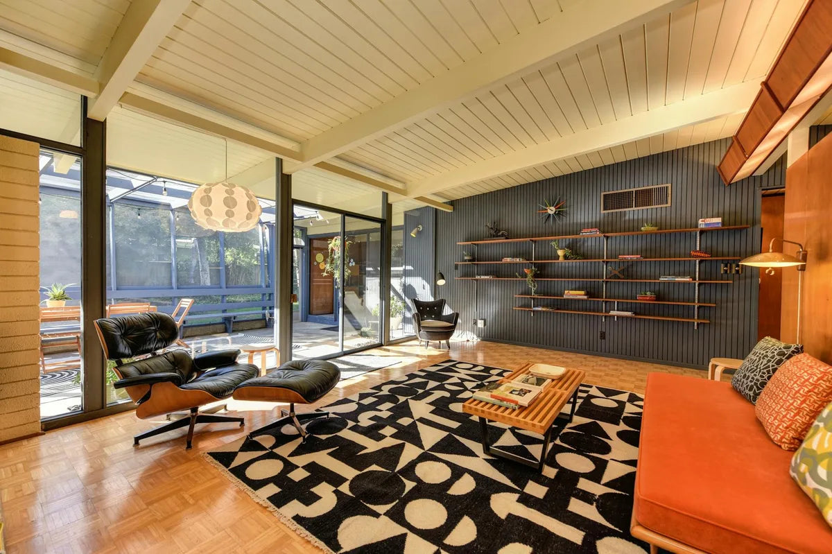 Eames chair in a bright 1960s living room